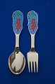 Michelsen Christmas spoons and Christmas forks of gilt sterling silver. Anton Michelsen set ...