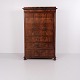 Tall antique mahogany chest of drawers from the 19th century, featuring seven drawers and a ...