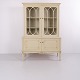 Vintage white-painted display cabinet by TUA Möbler of Tibro, Sweden. The upper section features ...