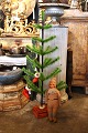 Christmas tree made of colored goose feathers on flexible metal branches and mounted on an ...