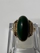 14 carat gold ladies ring with green jade.Stamped: LG 14k.Ring size 55.Nice and ...