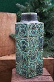 Royal 4 cornered faience Baca vase designed by Nils Thorsson from Aluminia with green / black ...