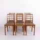 Set of six dining chairs dating from the 1920s, made in wood with upholstered seats in ...