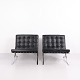 Pair of original Barcelona Chairs designed by Ludwig Mies van der Rohe and produced by ...