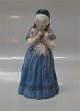 Royal 
Copenhagen 1323 
RC Girl from 
Bornholm 1911 
22 cm, Lotte 
Benter In mint 
and nice 
condition
