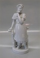 Royal 
Copenhagen 4131 
RC Girl with 
flowers and 
chicken 21.5 cm 
White, Bode 
Willumsen   In 
mint ...