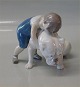 Bing and 
Grondahl dog 
B&G 1790 Boy 
with English 
bulldog 10 x 13 
cm Marked with 
the three Royal 
...