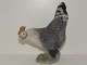 Royal 
Copenhagen 
figurine, Hen.
Decoration 
number 1024.
Factory first.
Height 14 cm., 
...