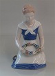 Bing and 
Grondahl B&G 
2345 Girl with 
flower  15 cm 
Marked with the 
three Royal 
Towers of ...