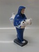 Royal 
Copenhagen 4357 
Oriental woman 
with three jars 
22 cm Johannes 
Hedegaard 1st  
In mint and ...