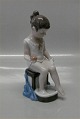 05 Girl 
"Susanne" Girl 
bathing her 
feet 18.5 cm 
Marked with a 
Royal Crown 
Handpainted, 
...