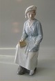 Bing and 
Grondahl The 
Graduator B&G 
1938 Student 
girl or nurse 
sitting 30 cm 
Marked with the 
...