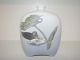 Royal 
Copenhagen Vase 
with 
decorations of 
two ducks.
The factory 
mark tells, 
that this was 
...