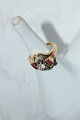 18 Karat gold 
ring, with 
great zirkon 
and red 
sapphire. Ring 
Size 53,5. 
Diameter 17 mm. 
The ...