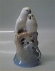 Royal 
Copenhagen bird 
0649 RC Parrots 
on branches 
Theordor Madsen 
1905 19 cm  In 
mint and nice 
...