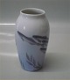Royal 
Copenhagen RC 
89-88A Vase 
with fish 12.5 
cm pre- 1923 
Painter 66 2nd. 
In mint and 
nice ...