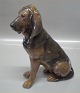 Royal 
Copenhagen dog 
1322 RC 
Bloodhound 
female sitting 
Designed by 
Lauritz Jensen 
1911 22.5 cm  
...