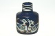 Royale 
Copenhagen Baca 
vase in blue 
faience with 
motif of two 
birds.
Designer Nils 
...