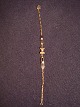 Bracelets
Gold 9k
adorned with
3 zirconia
length 18.5 cm