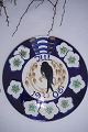 Faience, 
Aluminia 
Christmas plate 
from 1906 with 
motiv of  Bird 
and christmas 
rosé, no. 477 
...