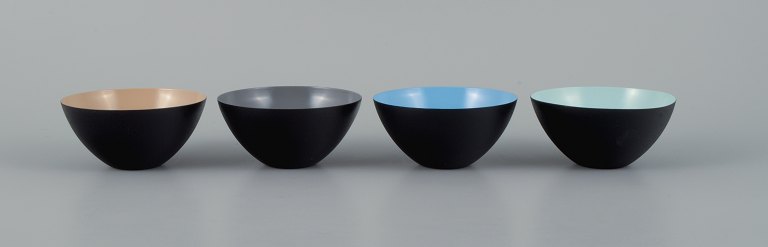 Four small bowls in metal.
Brown, grey, blue and mint green.