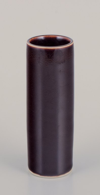 Hertha Bengtson for Rörstrand, Sweden. Unique ceramic vase. Cylinder-shaped with 
brown glaze.