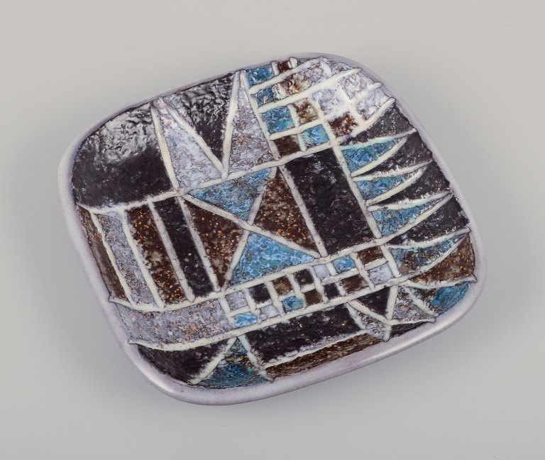 Ingrid Atterberg for Upsala Ekeby, Sweden. Ceramic "Tri" dish. Geometric pattern 
with polychrome glaze.