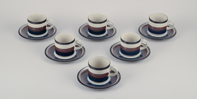 Anja Jaatinen-Winquist for Arabia, Finland. A set of six "Kaira" coffee cups 
with saucers.