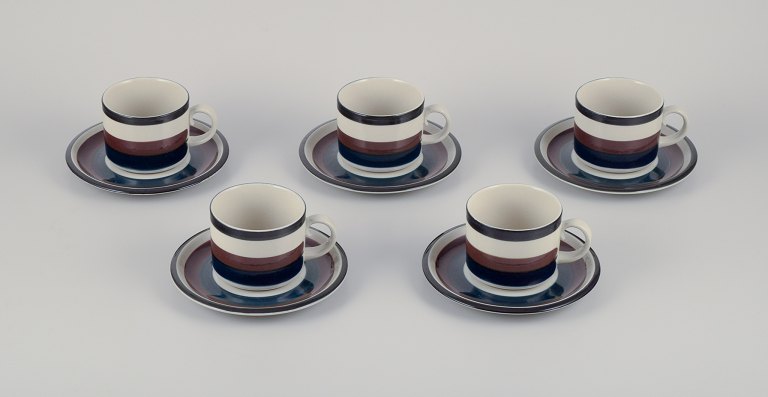 Anja Jaatinen-Winquist for Arabia, Finland. A set of five ”Kaira” teacups and 
saucers. Stoneware.