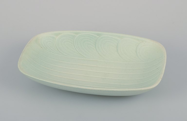 Rörstrand, Sweden. Large ceramic bowl in a modernist design. Rare model. Glaze 
in light green tones.