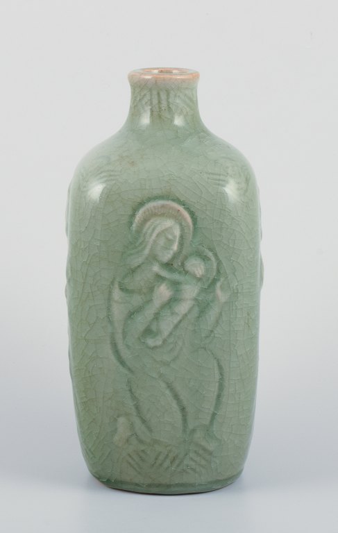 Jais Nielsen for Royal Copenhagen. Ceramic vase in celadon glaze with religious 
motifs.
