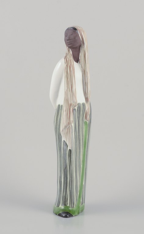 Mari Simmulson for Upsala-Ekeby, Sweden. Ceramic figurine of an Indonesian 
woman.