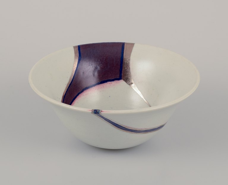 European studio ceramist, unique ceramic bowl. Iron glaze.