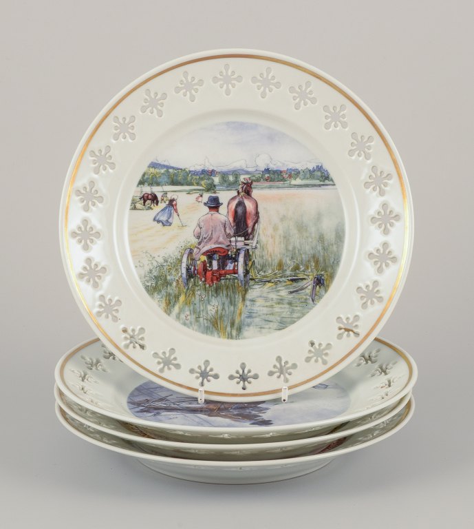 Bing & Grøndahl, Denmark. A set of four porcelain plates featuring motifs from 
Carl Larssons paintings.