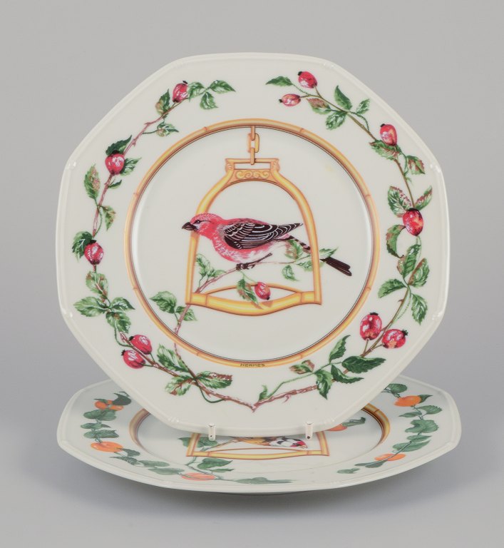 Hermès, France. Two porcelain plates with bird motifs.