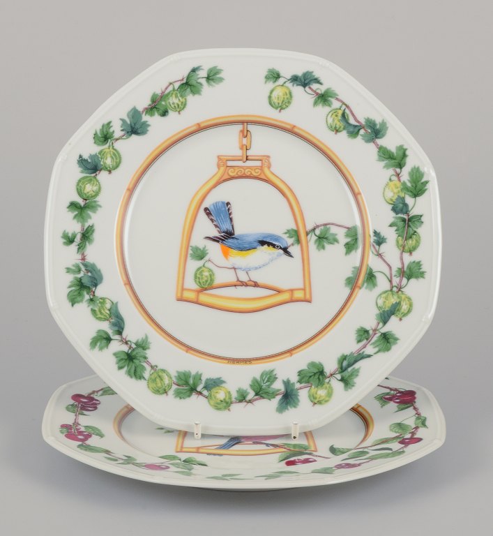 Hermès, France. Two porcelain plates with bird motifs.