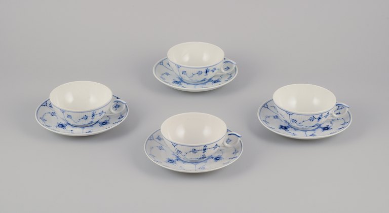 Royal Copenhagen Blue Fluted Plain. A set of four teacups with saucers.