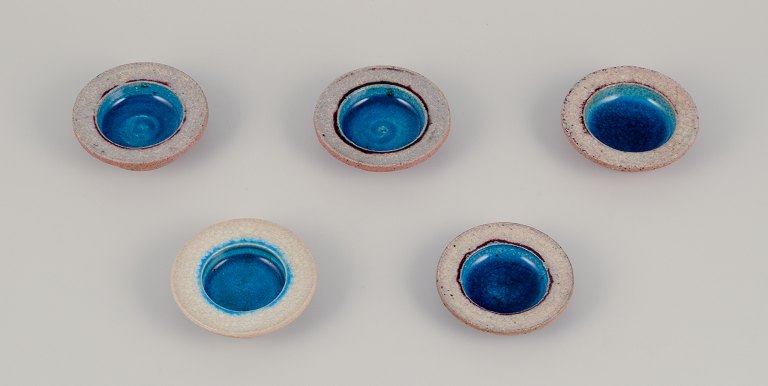 Nils Kähler for Kähler. Five small ceramic bowls. Unglazed with turquoise glaze.