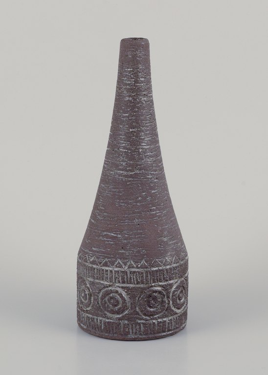 Elsi Bourelius (1909-2001), Swedish ceramicist.
Ceramic vase. Unglazed with a geometric pattern.