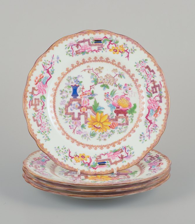 Mintons, England.
Set of four lunch plates in faience.