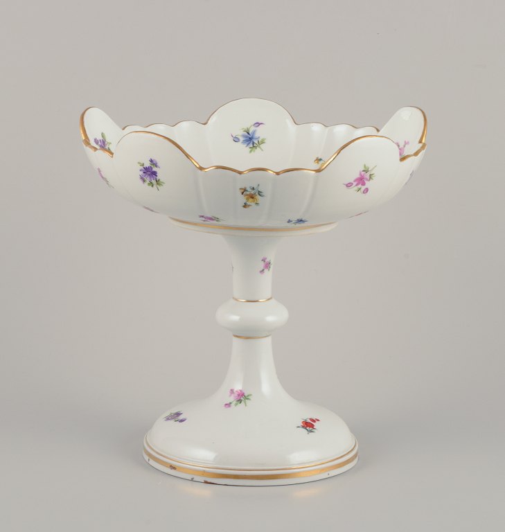 Meissen, Germany. Large porcelain centerpiece.
Hand-painted with polychrome floral motifs.