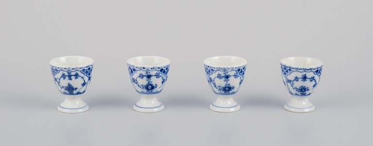 Royal Copenhagen Blue Fluted Half Lace, a set of four egg cups.