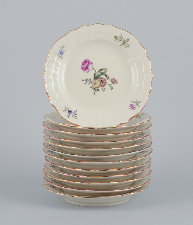 Royal Copenhagen, "Frijsenborg". Twelve plates.