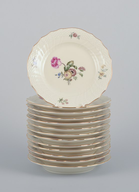 Royal Copenhagen, "Frijsenborg". Thirteen plates.