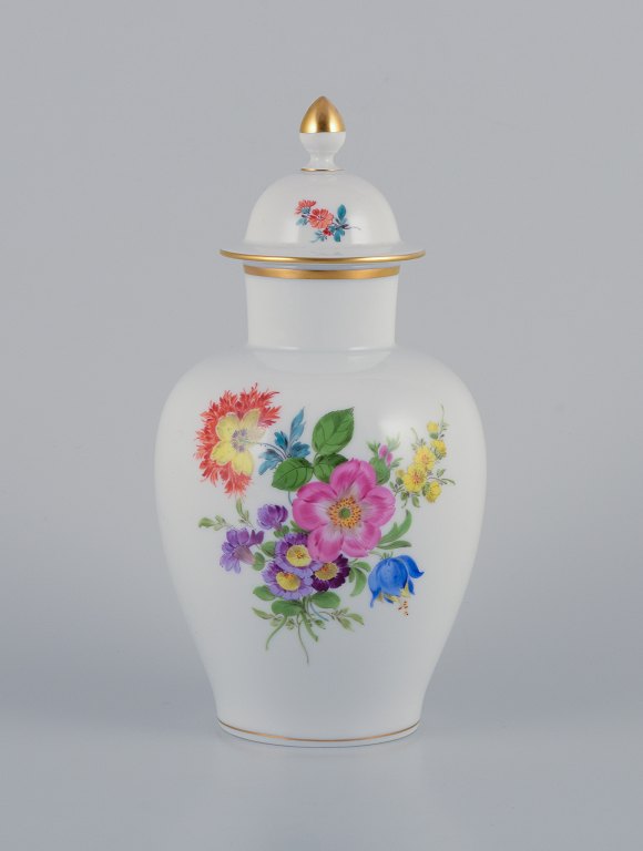 Meissen, low vase in porcelain. Polychrome flower motifs in overglaze.