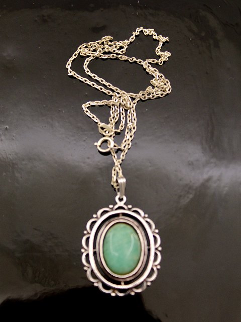 Sterling silver pendant with turquoise