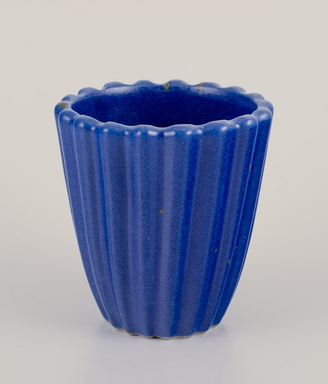 Christian Poulsen, own workshop, Denmark. 
Unique ceramic vase in grooved design.