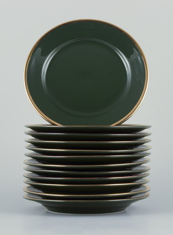 Pillivuyt, France. A set of twelve porcelain cake “Green Bistro” plates.