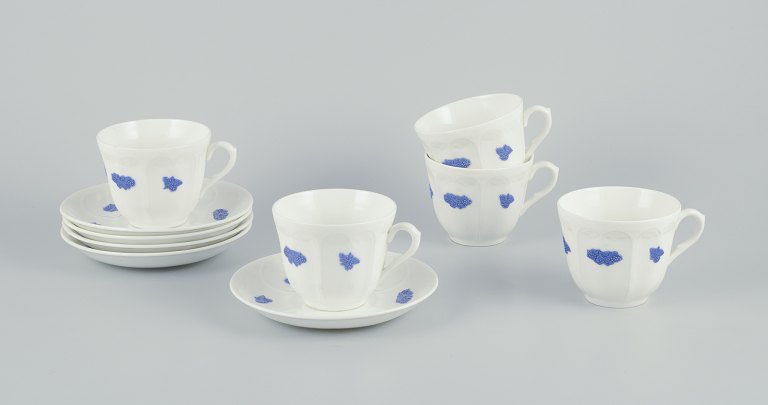 Gustavsberg, Sweden. A set of five large porcelain coffee cups with saucers.