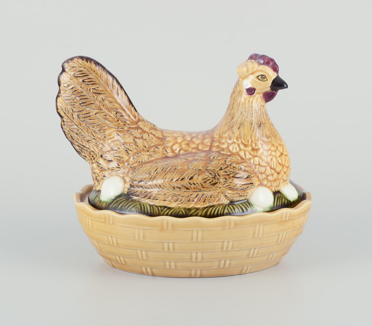 Porcelain hen. 
Probably Germany.